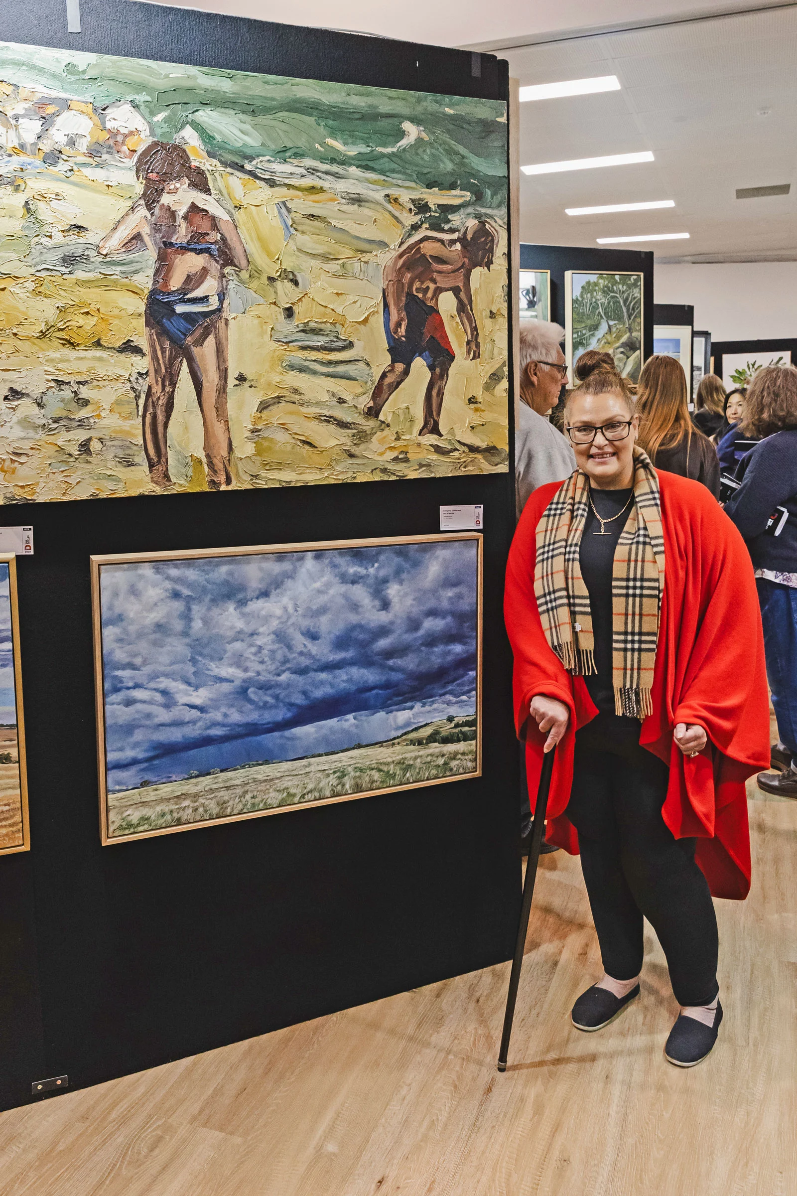 Jane Allan at the Doyles Art Award 2026 exhibition beside Seaside Explorers